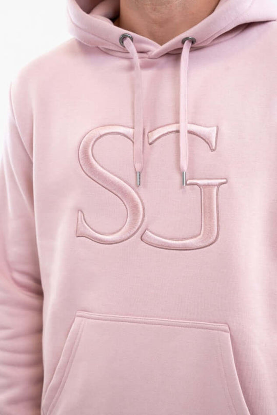 Lusso Sweat SG unisex sweatshirt in soft pink with 3D relief logo and kangaroo pocket, perfect for daily wear.